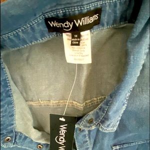 Wendy Williams light blue denim jumpsuit